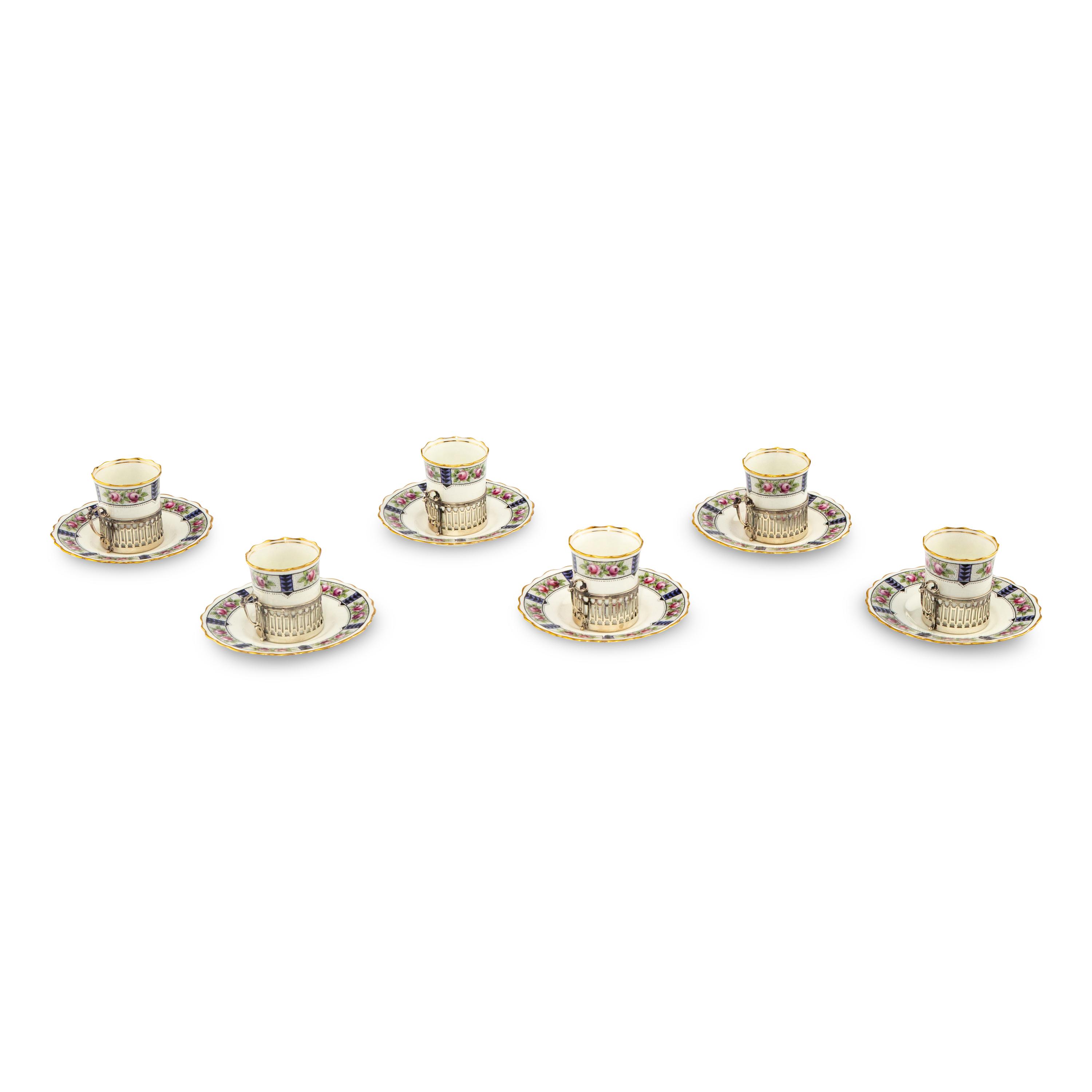 A Set of Six Aynsley Porcelain Coffee Cups and Saucers with Silver Liners