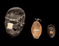 Three Dan Passport Masks, An Ashanti Wood Idol, and Two Wood Figures