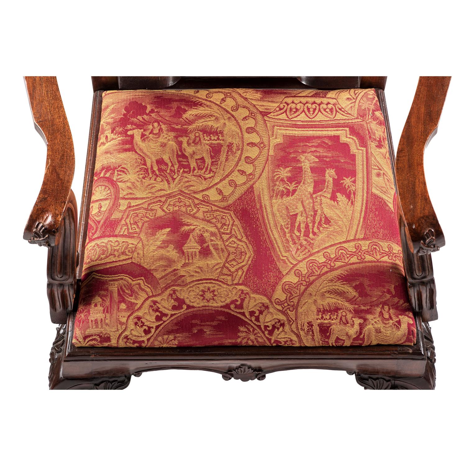 A Set of Eight Chippendale-Style Carved Mahogany Dining Chairs