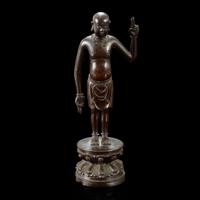 A Chinese bronze figure of the infant Buddha Ming dynasty