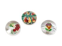 A Five Pears Glass Paperweight, a Bundle of Cherries Glass Paperweight and a Pansy Glass Paperweight