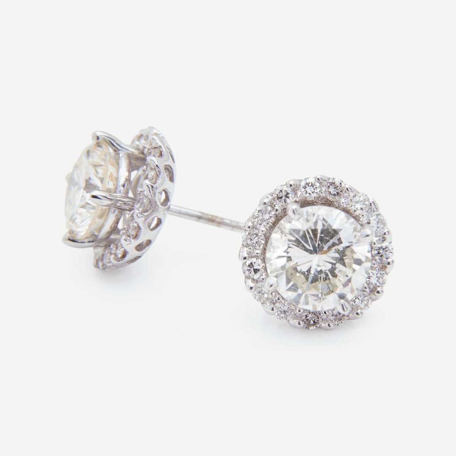 A Pair of 18K White Gold and Diamond Stud Earrings