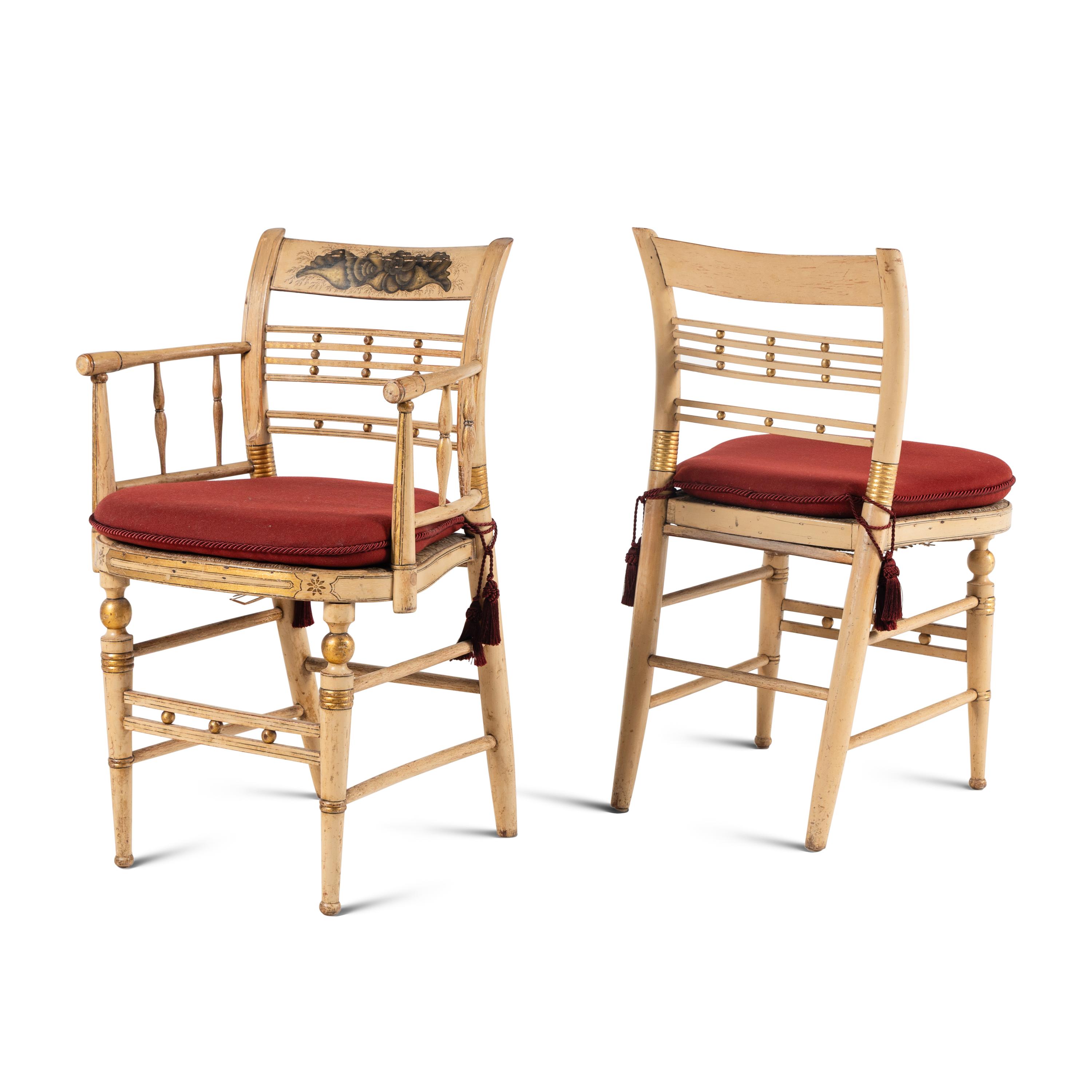 A Set of Four Classical Cream-Painted and Parcel Gilt "Hitchcock" Dining Chairs