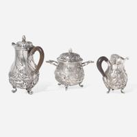 A miniature Continental silver repoussé three-piece coffee service, probably 19th century