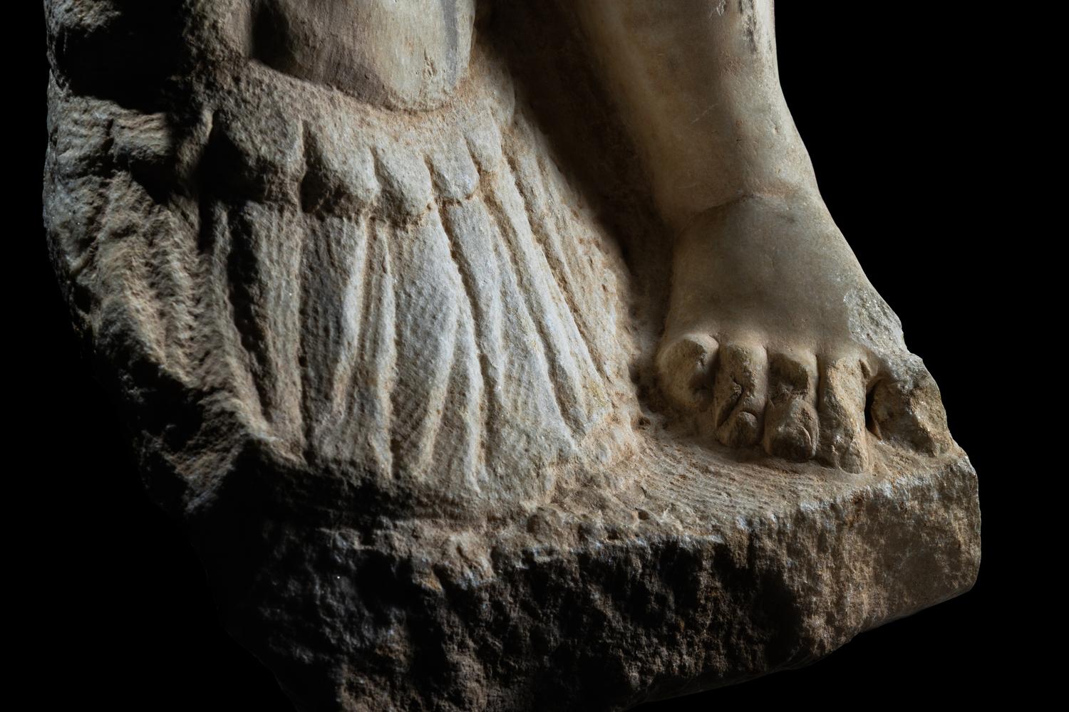 A Roman Marble Fragment from a Monumental Statue of the God Mars