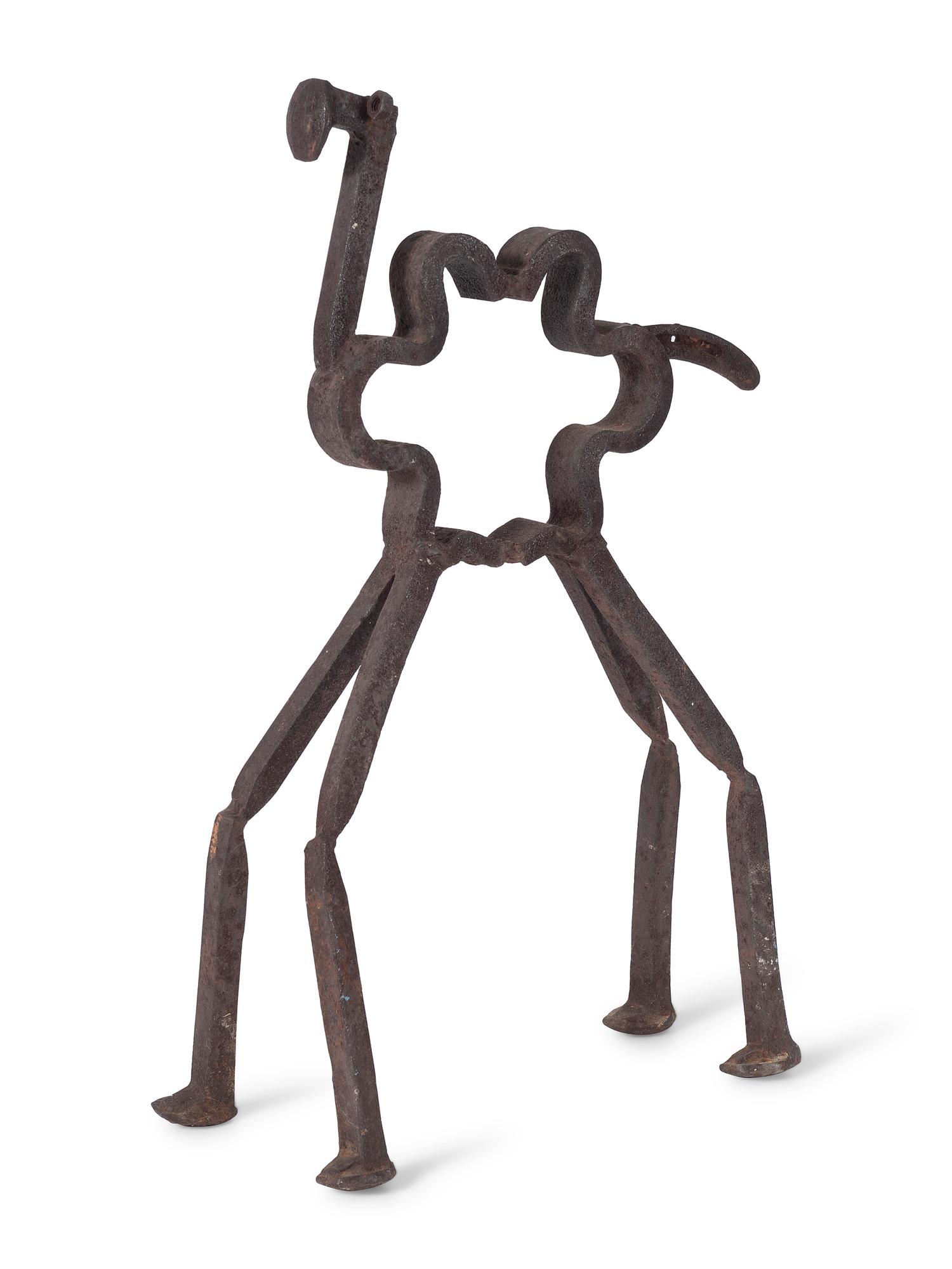 A Wrought Iron Camel Form Garden Figure