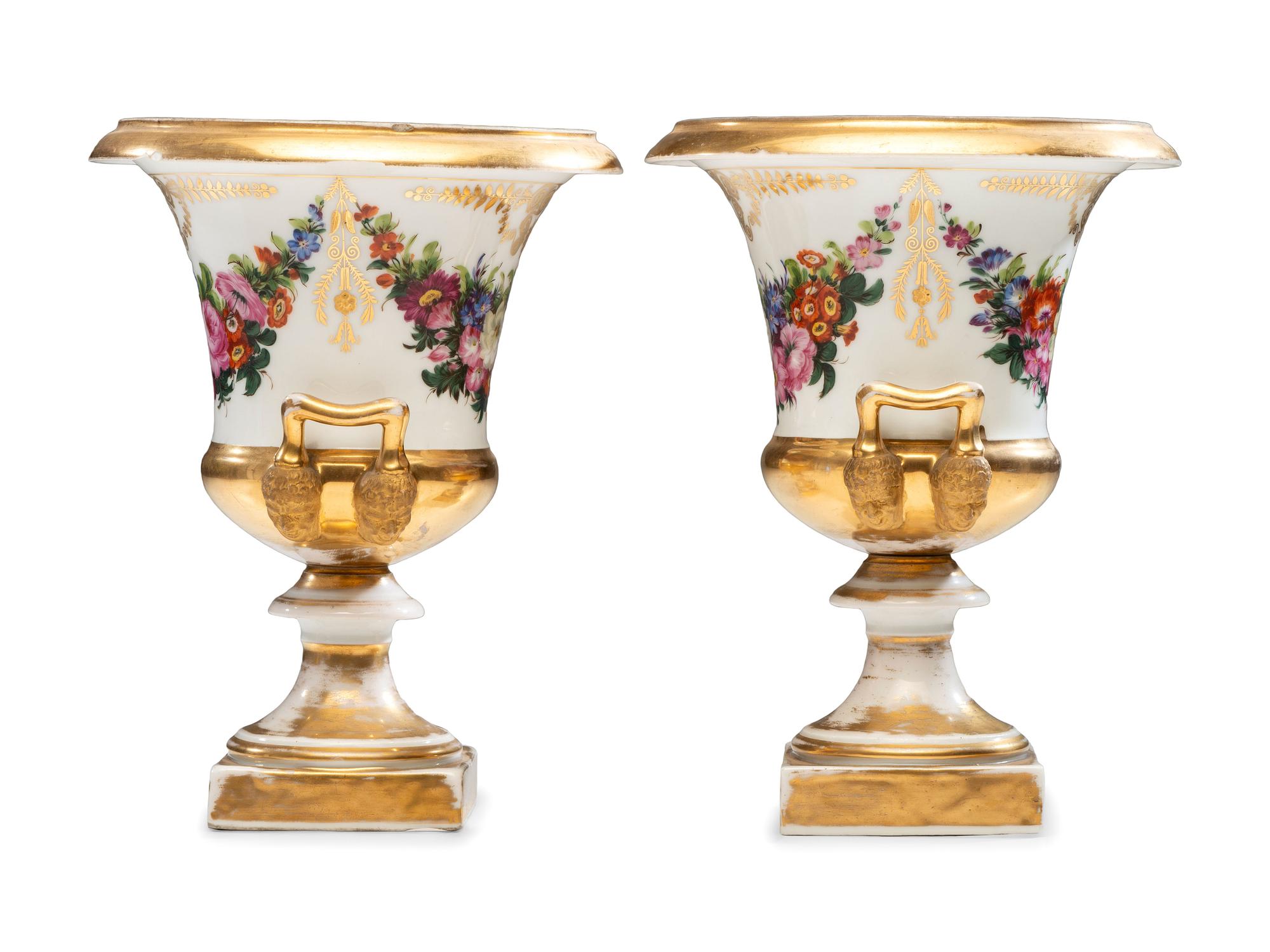 A Pair of Parcel Gilt and Polychrome Decorated Porcelain Vases