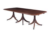 A Regency Style Satinwood Banded Mahogany Triple-Pedestal Dining Table