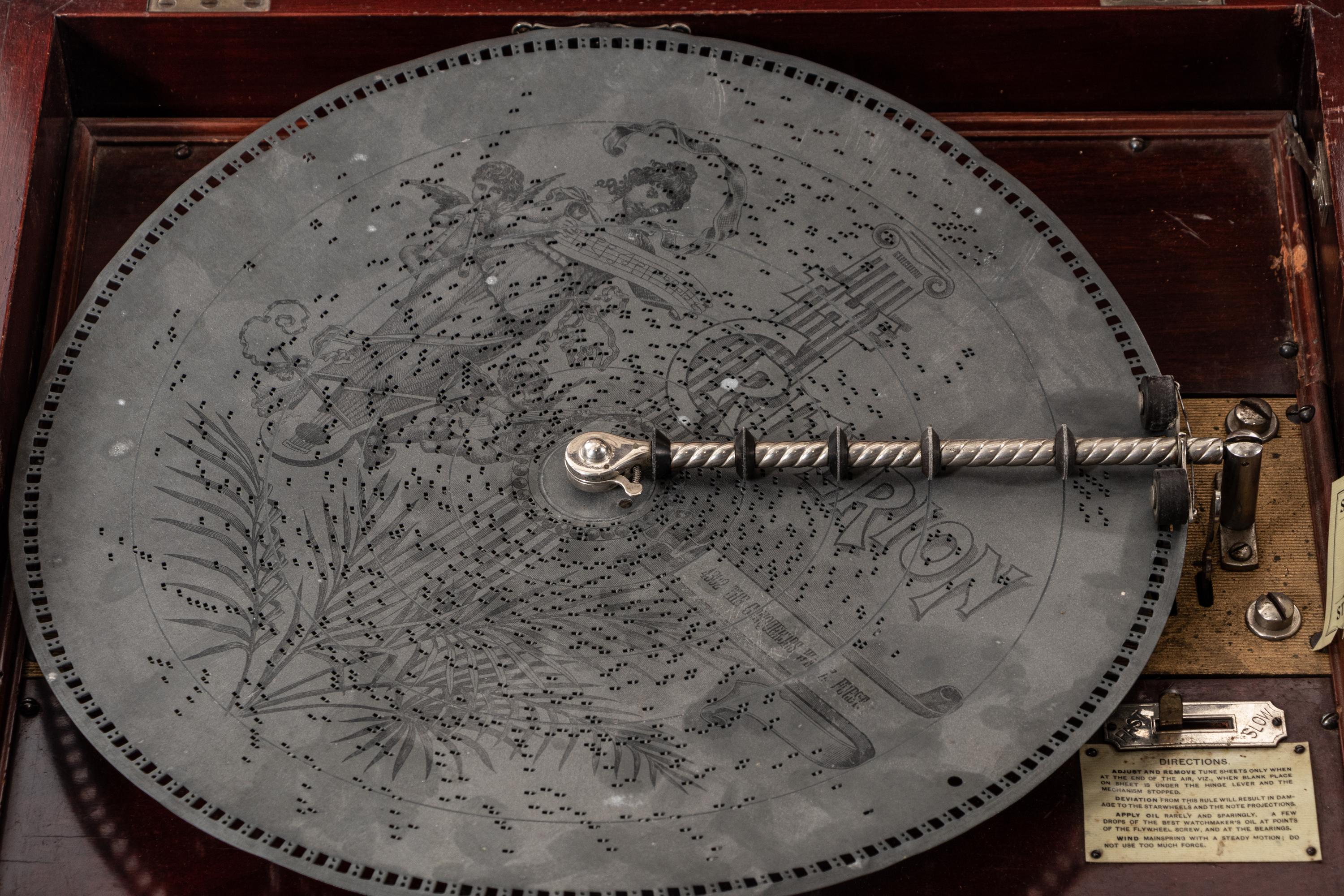 A Criterion Walnut Music Box with Ten Discs
