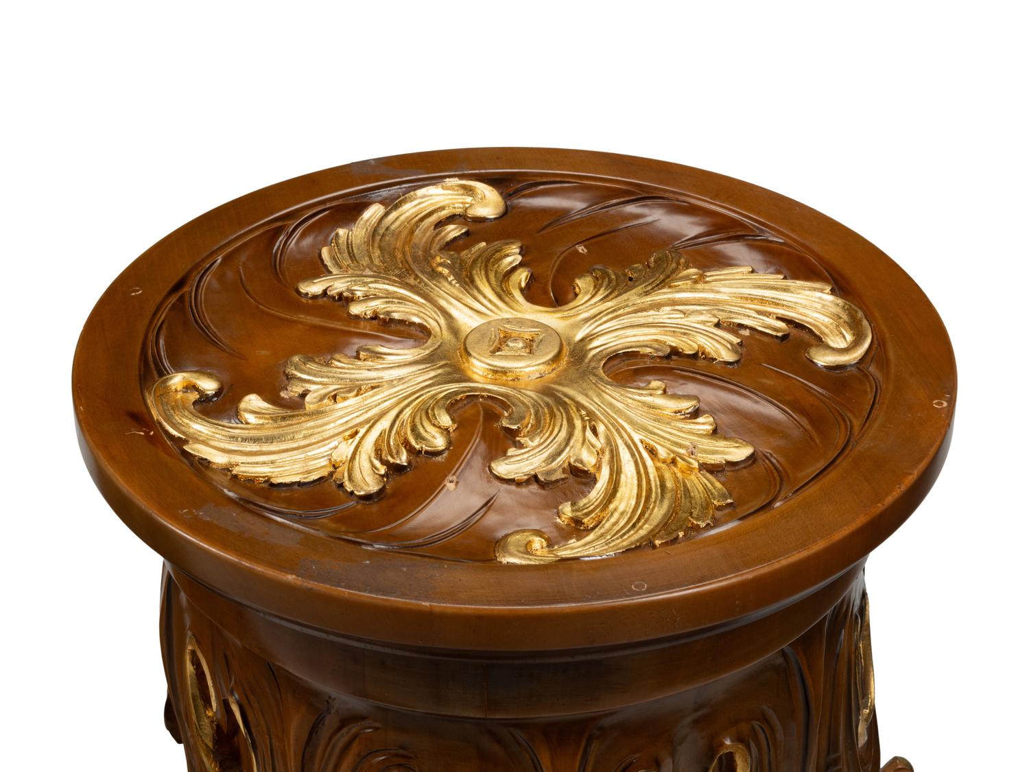 A Pair of Italian Carved and Parcel Gilt Column Capitals