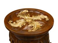 A Pair of Italian Carved and Parcel Gilt Column Capitals