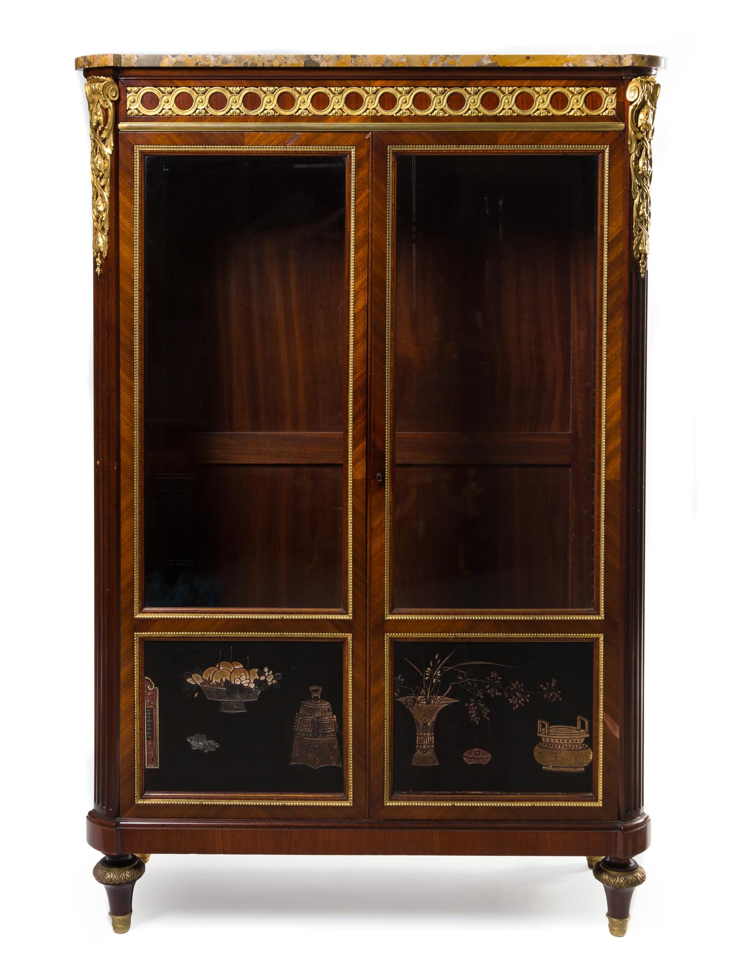 A Louis XVI Style Gilt Bronze and Coromandel Lacquer Mounted Mahogany Vitrine Cabinet Height 60 5/8 x width 40 1/2 x depth 16 inches. — 19TH CENTURY