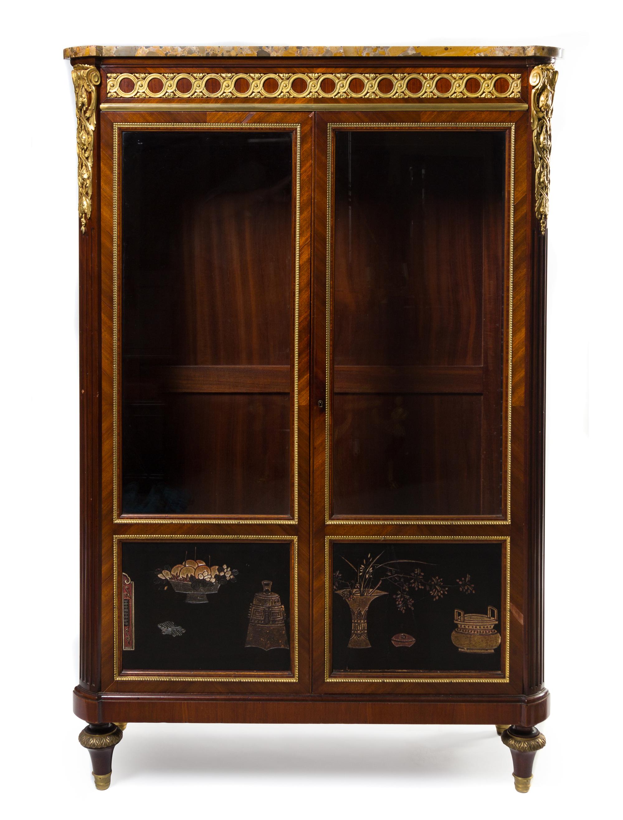 A Louis XVI Style Gilt Bronze and Coromandel Lacquer Mounted Mahogany Vitrine Cabinet Height 60 5/8 x width 40 1/2 x depth 16 inches. — 19TH CENTURY