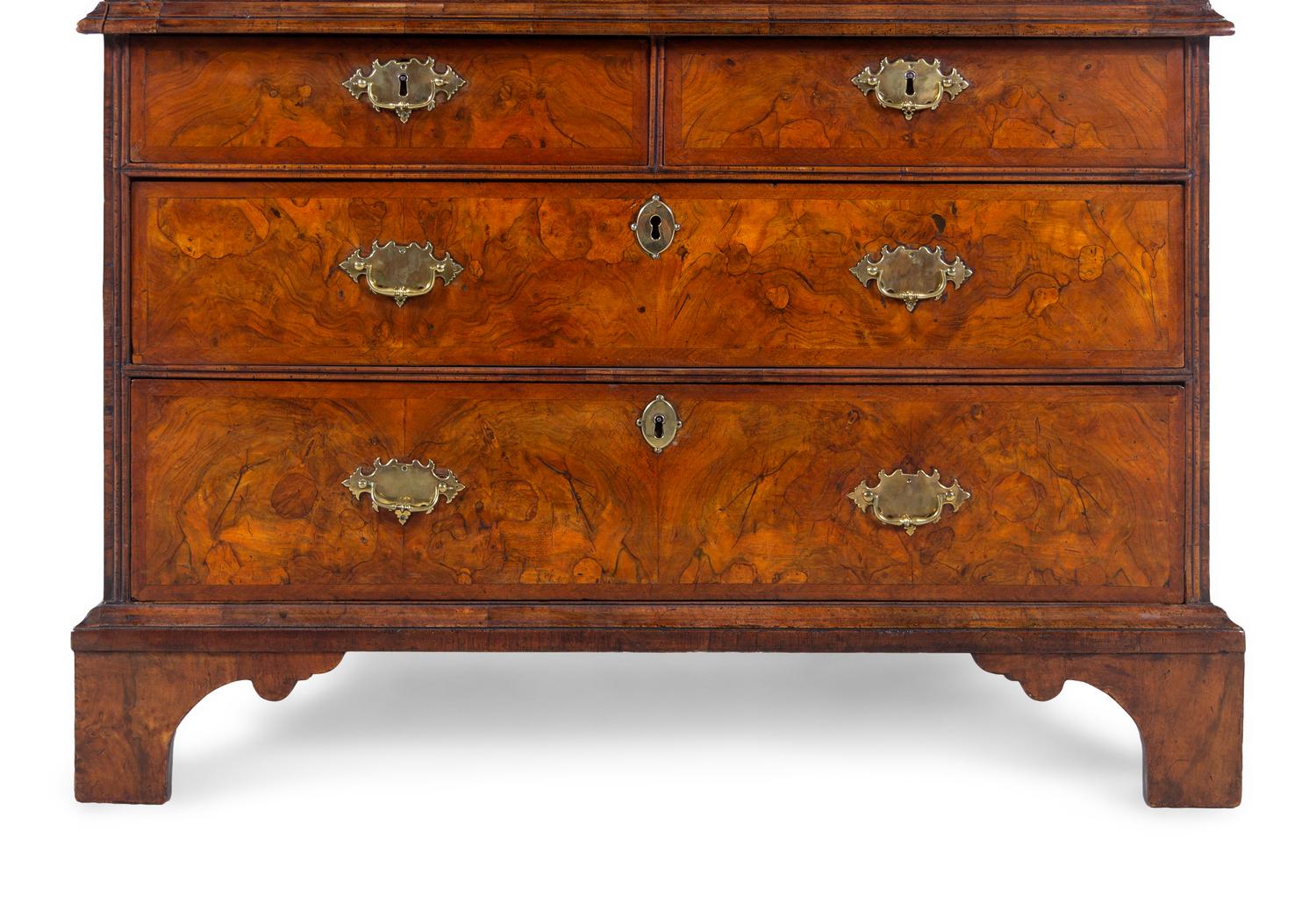 A George I Carved Burl Walnut Double-Dome Bureau Bookcase