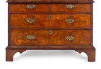 A George I Carved Burl Walnut Double-Dome Bureau Bookcase