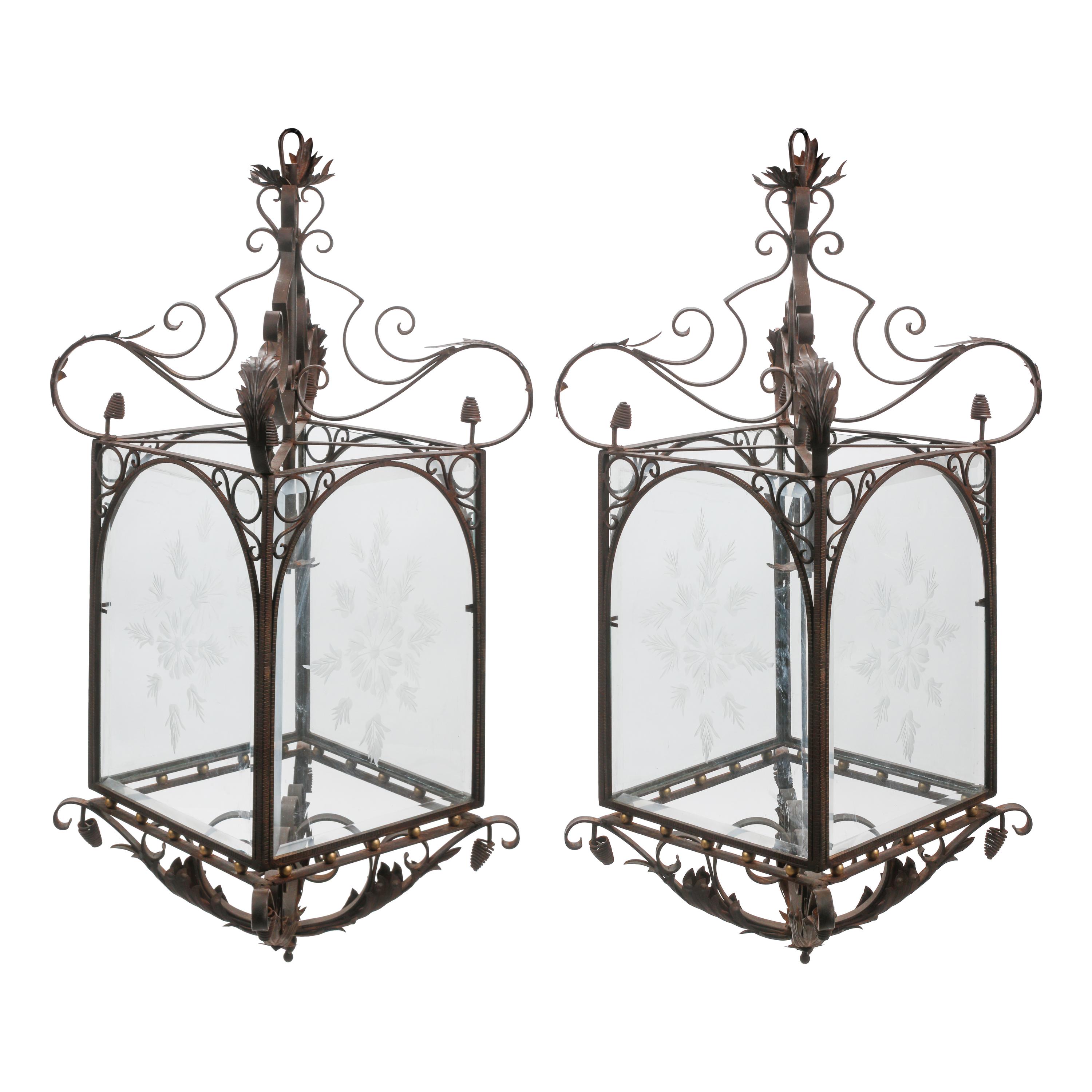 A Pair of Louis XV Style Iron and Parcel Gilt Etched Glass Hall Lanterns