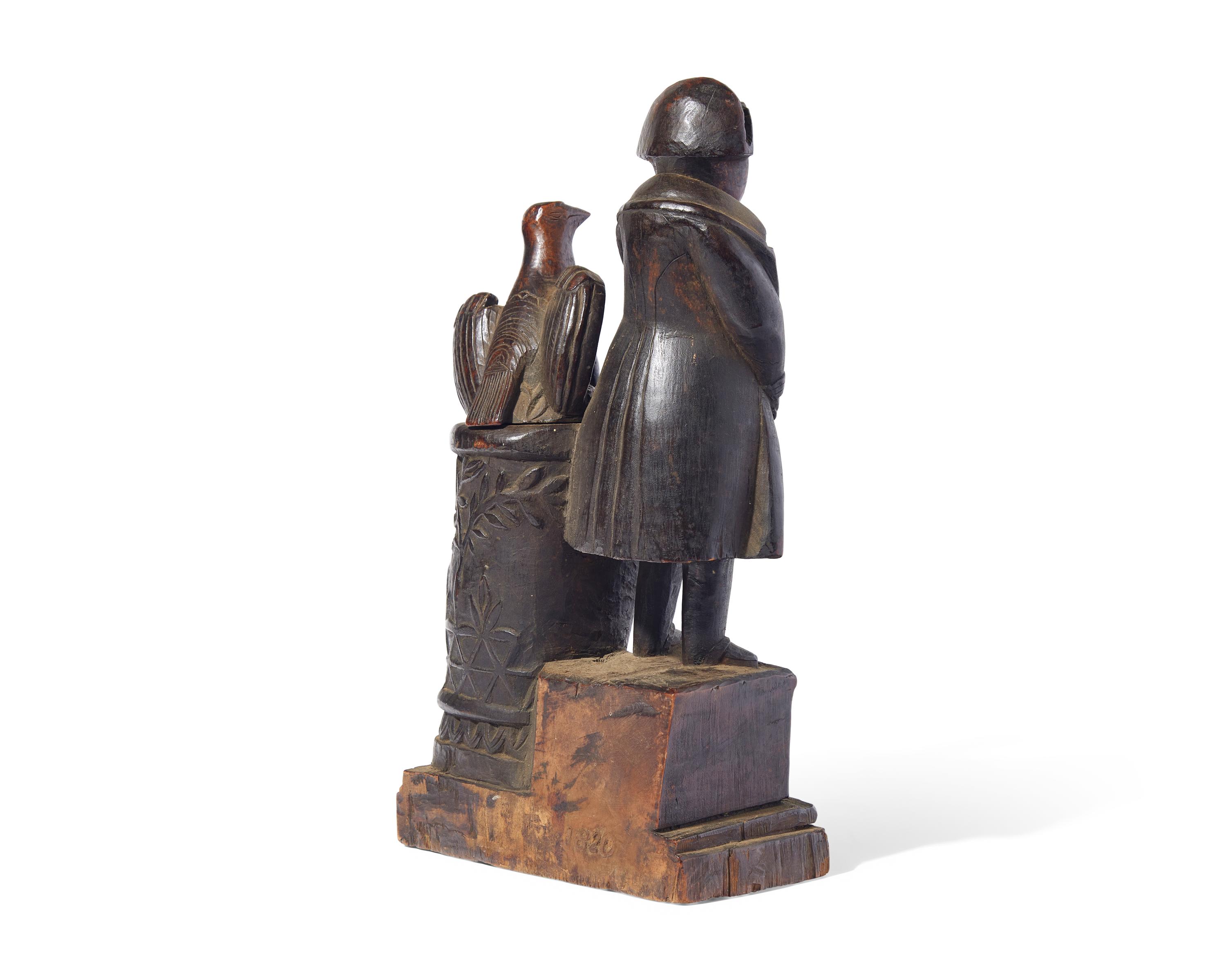 A Carved Wood Watch Hutch in the Form of Napoleon with Eagle