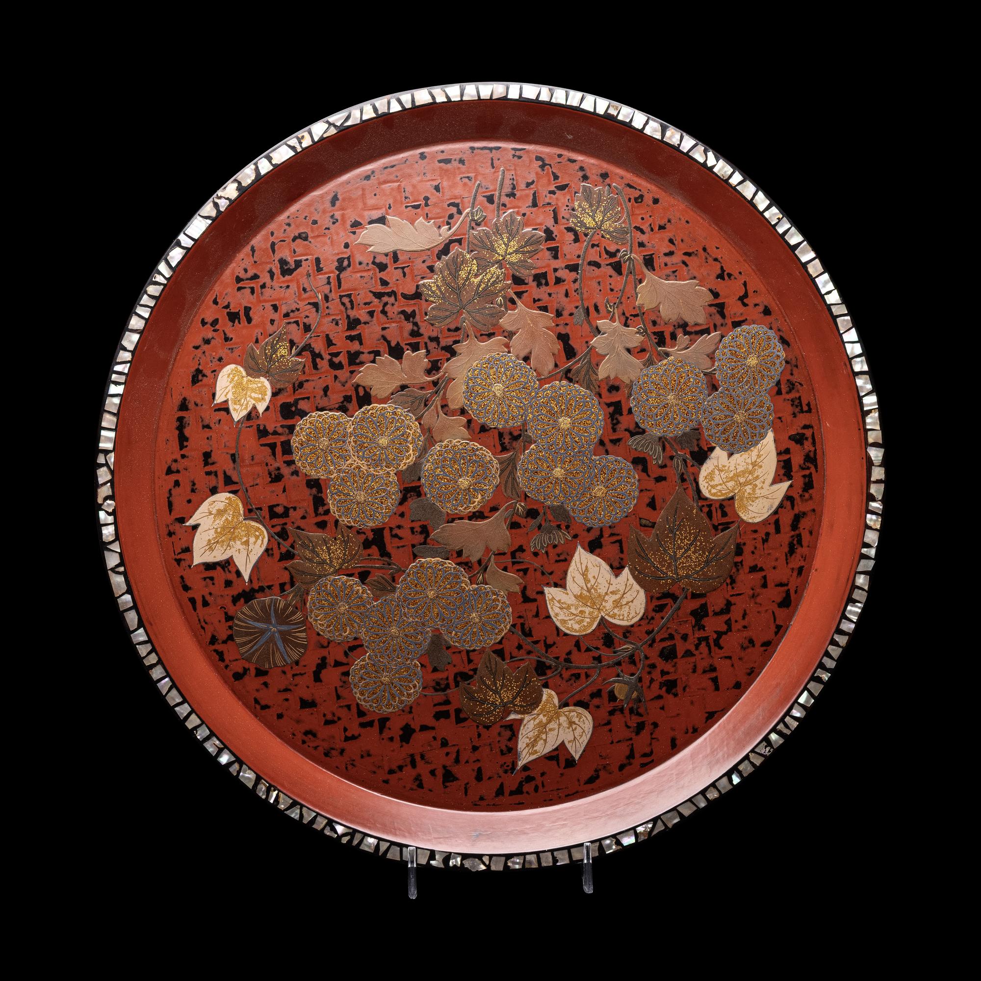 A Japanese Gold and Red Lacquer Circular Tray
