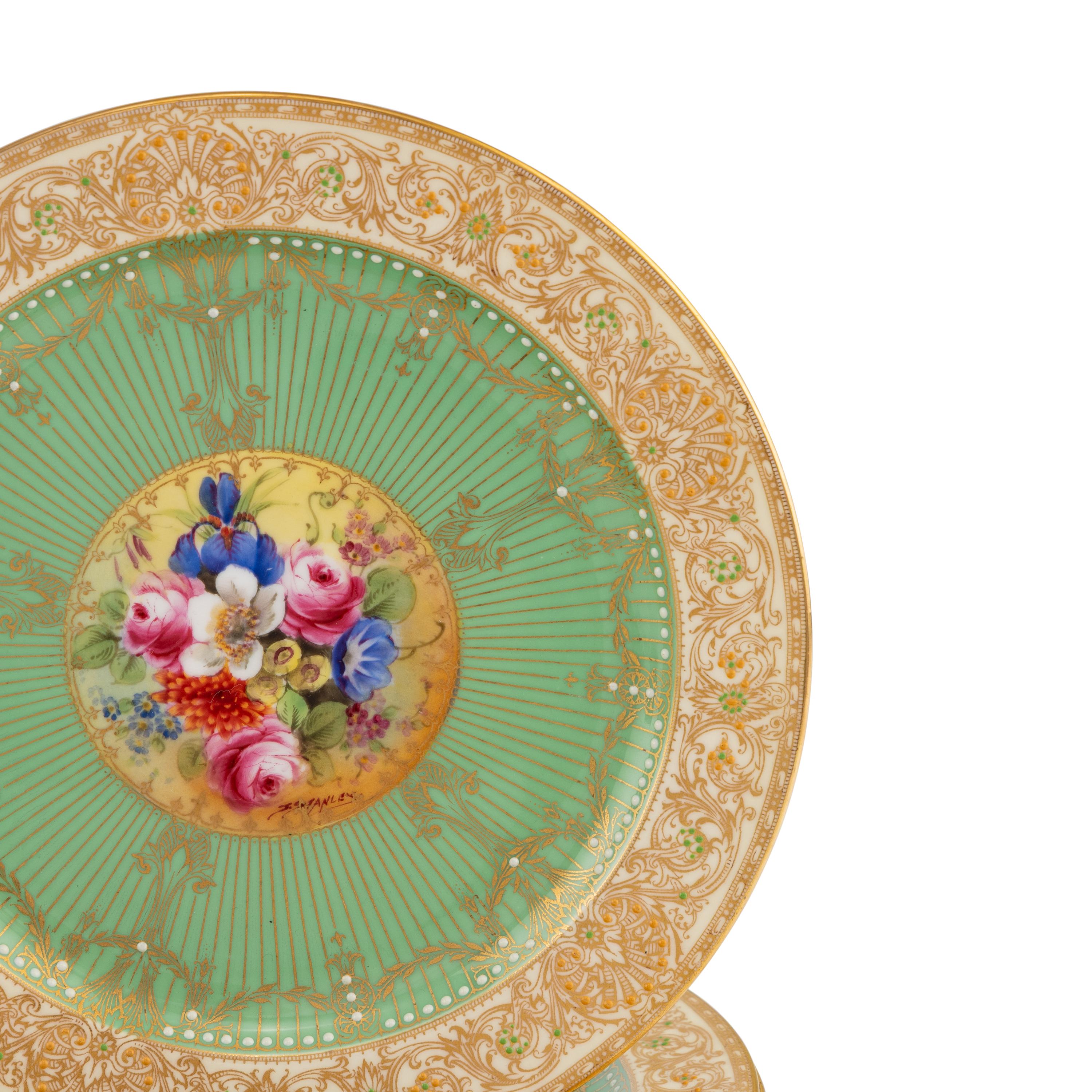 A Set of Seventeen Royal Worcester Painted Porcelain Dessert Plates