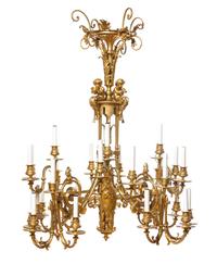 A Neoclassical Gilt Bronze Twenty-Eight-Light Chandelier Height 42 x diameter 37 inches.