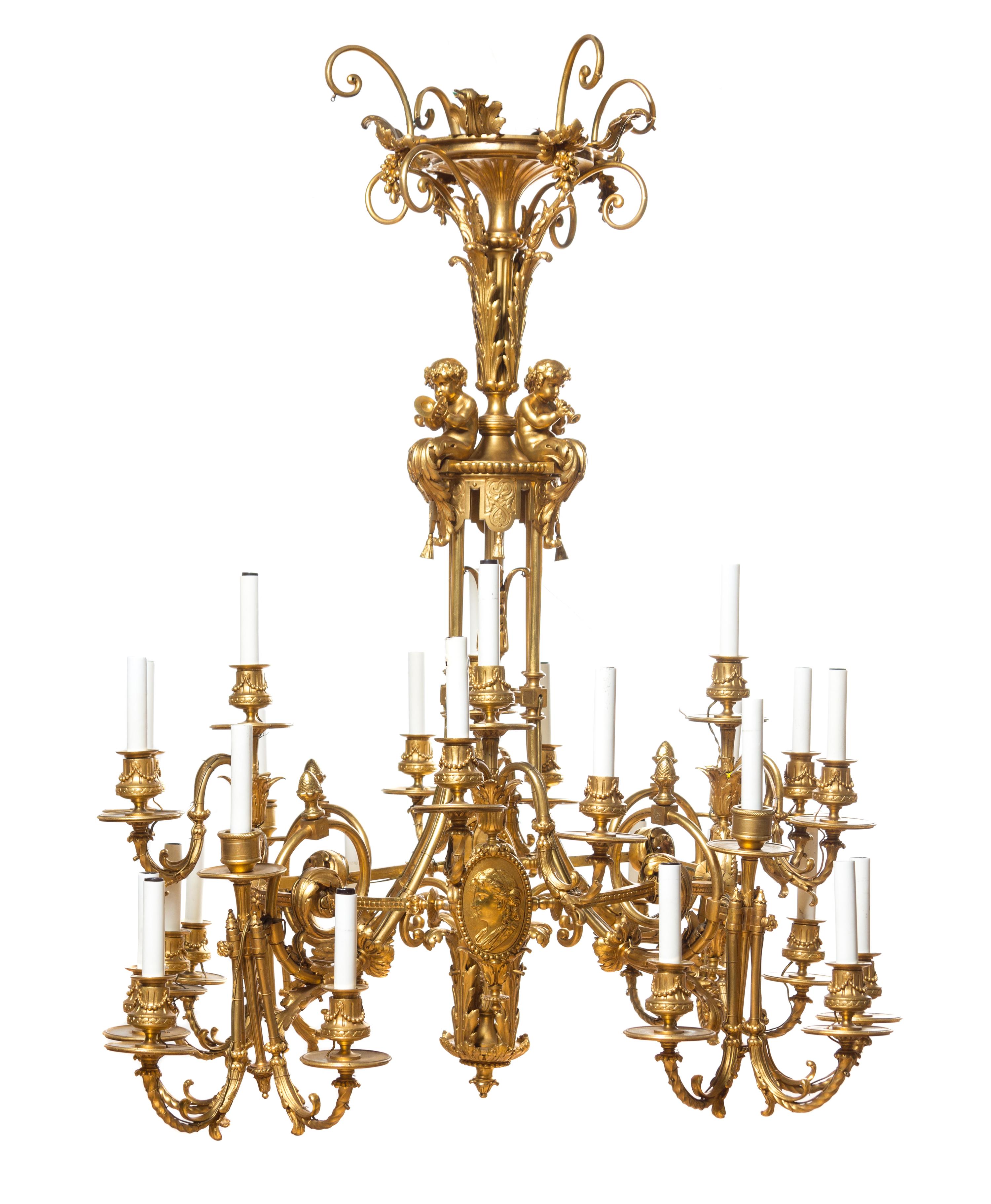 A Neoclassical Gilt Bronze Twenty-Eight-Light Chandelier Height 42 x diameter 37 inches.