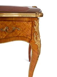 A Louis XV Style Gilt Bronze Mounted Parquetry Bureau Plat and Regency Style Parcel Gilt Chair