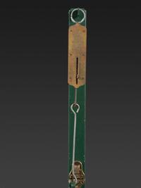 A Carved and Painted Wood Figural Post Office Scale