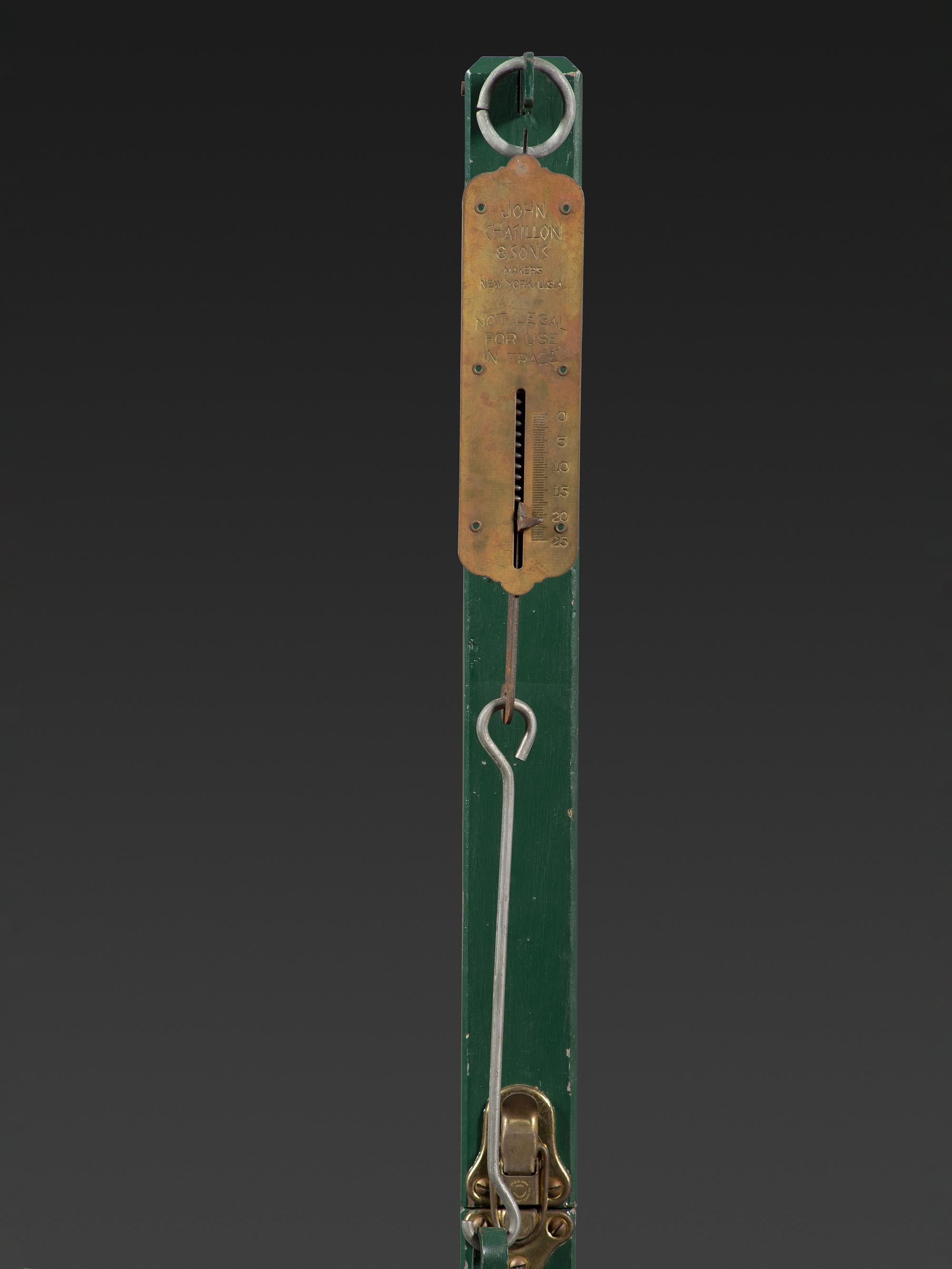 A Carved and Painted Wood Figural Post Office Scale