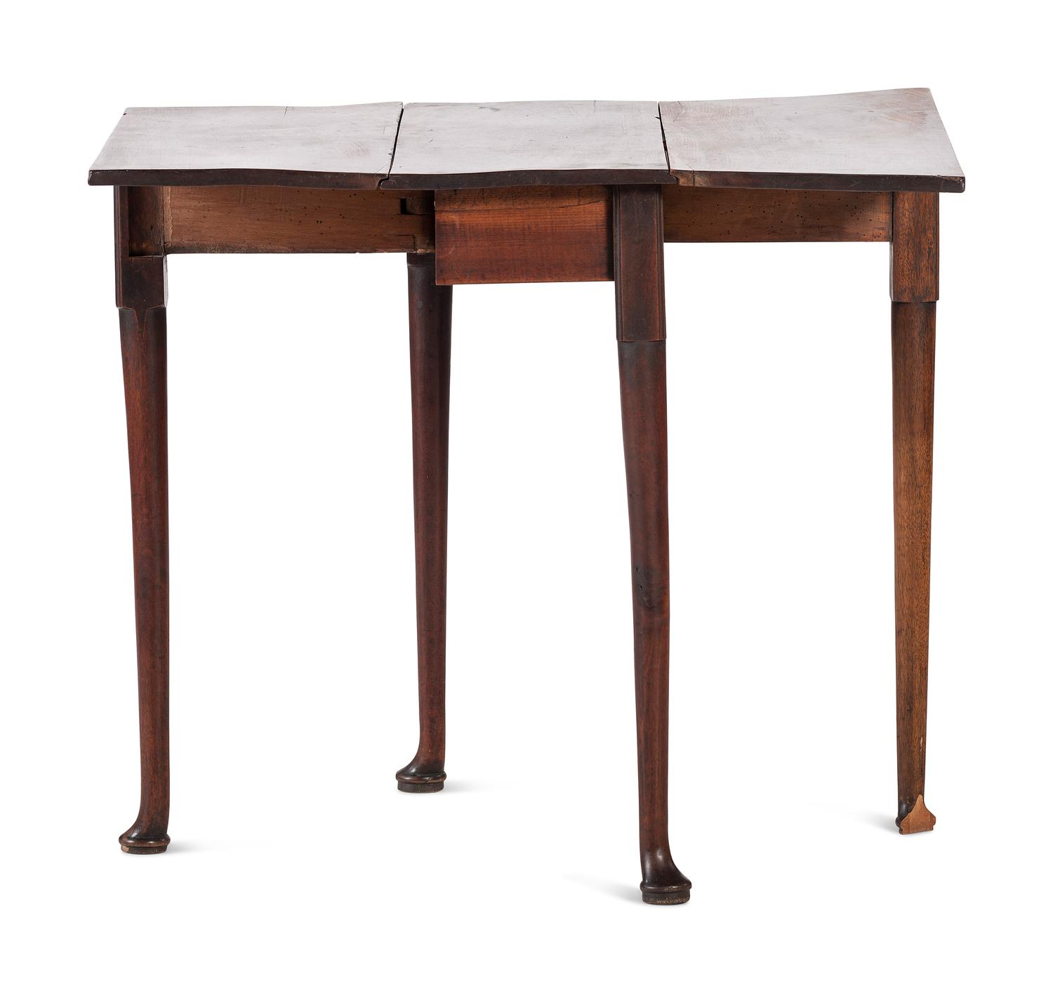 A George III Figured Mahogany Pad-Foot Drop-Leaf Table