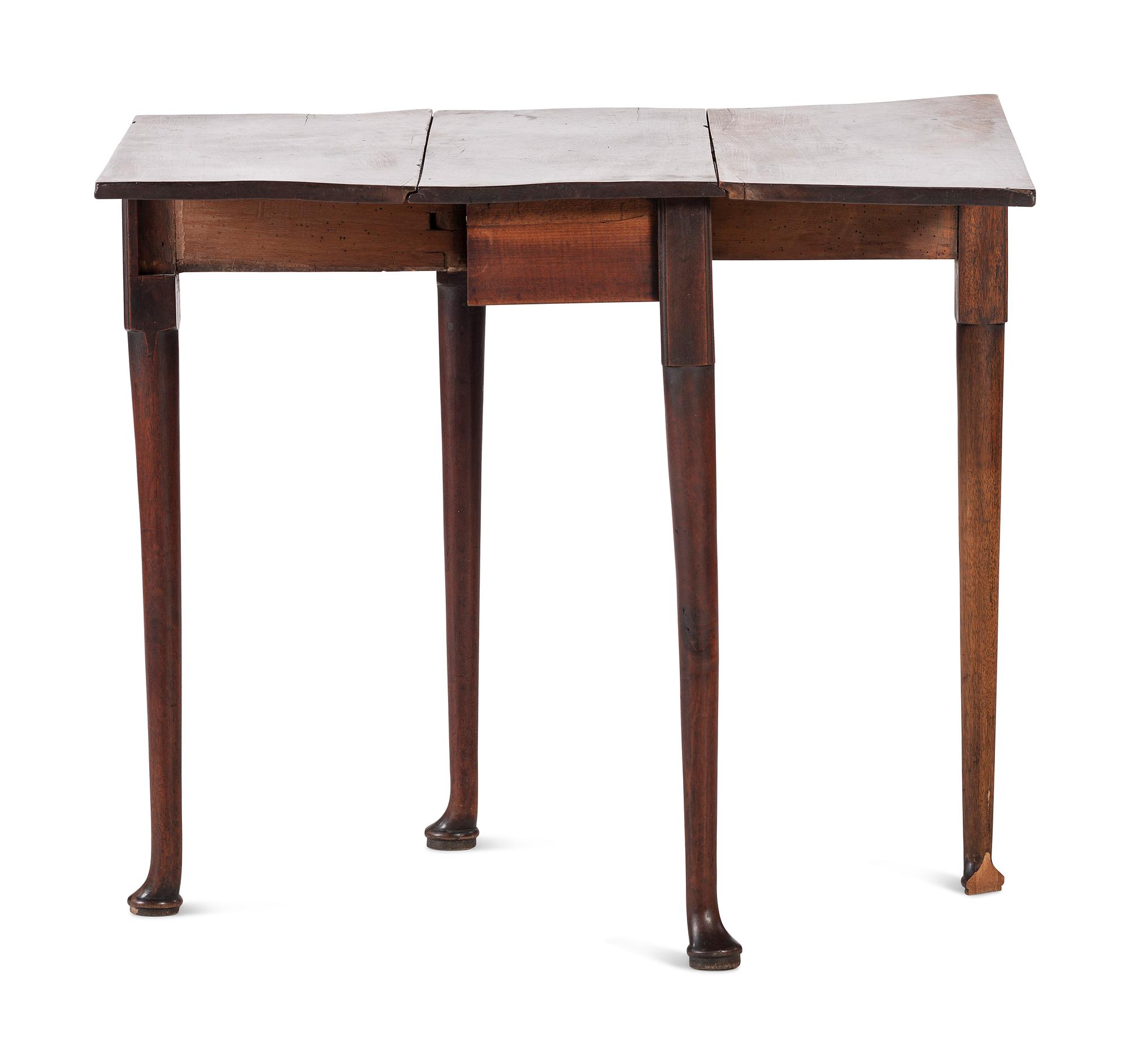 A George III Figured Mahogany Pad-Foot Drop-Leaf Table