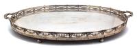 A Continental Silver Two-Handle Tray, 19TH CENTURY, having a pierced gallery, with goat's head and laurel swag decoration on a mahogany