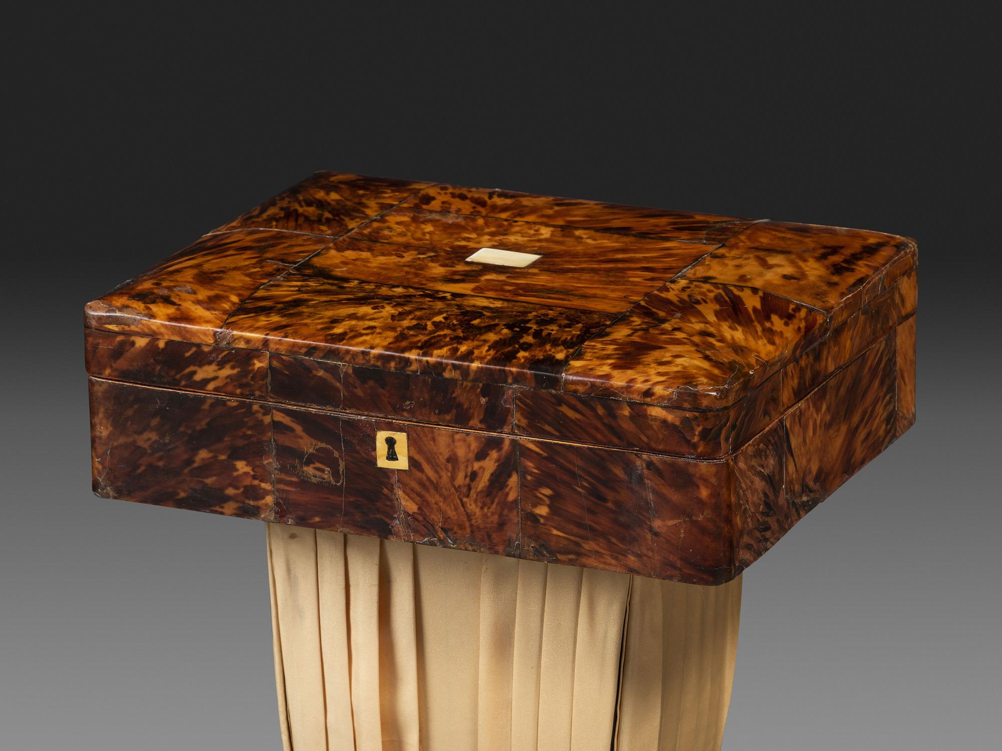 A Regency Tortoiseshell Veneered Sewing Table