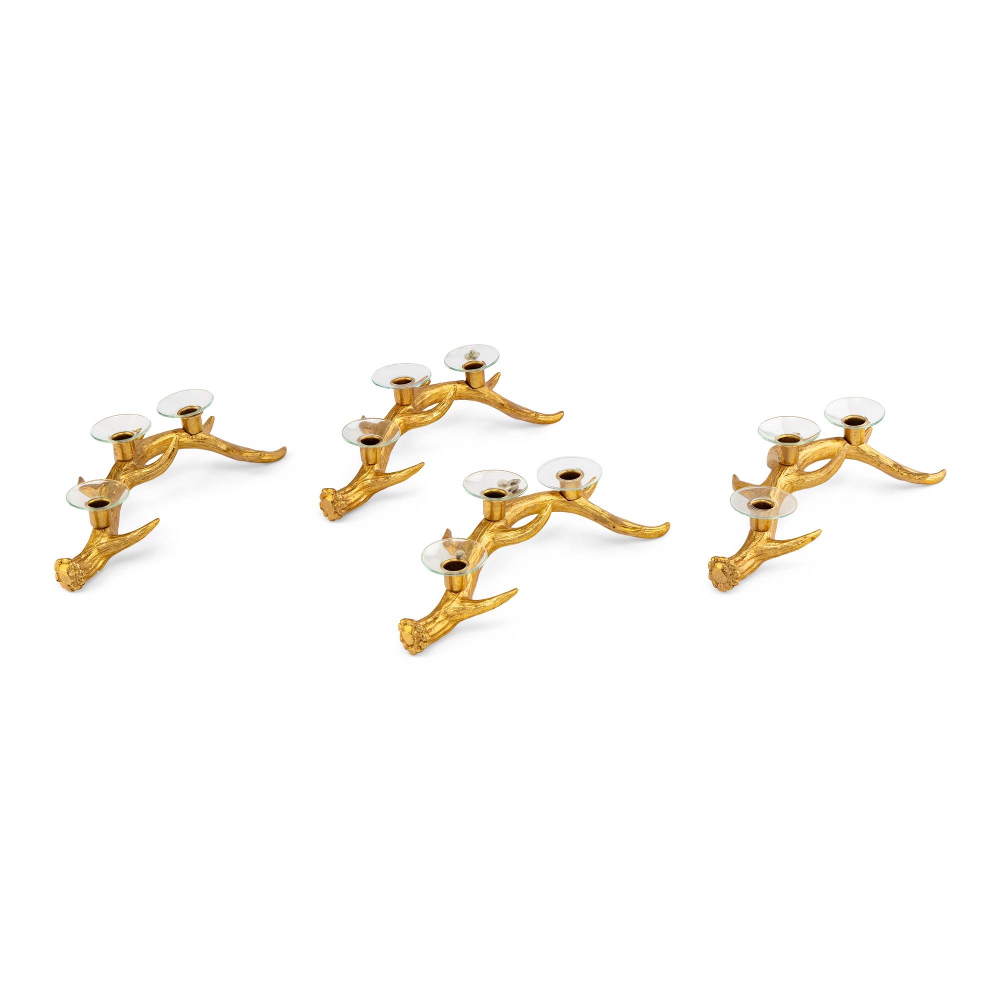 A Set of Four Gilt Metal Antler-Form Three-Light Candelabra
