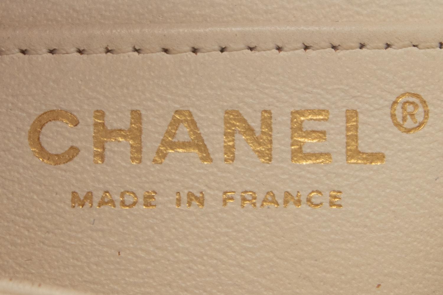 Chanel Mini Flap Bag in White Caviar Leather