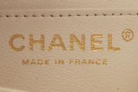 Chanel Mini Flap Bag in White Caviar Leather