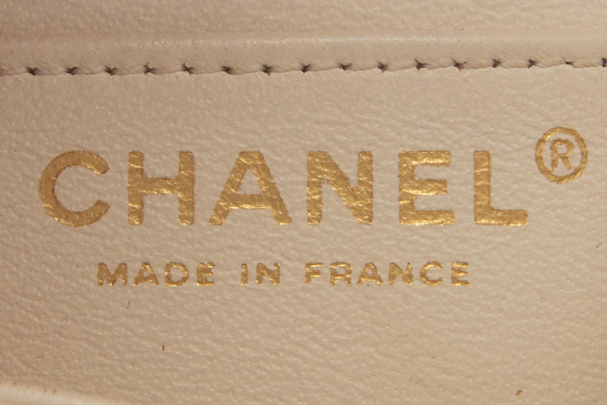 Chanel Mini Flap Bag in White Caviar Leather