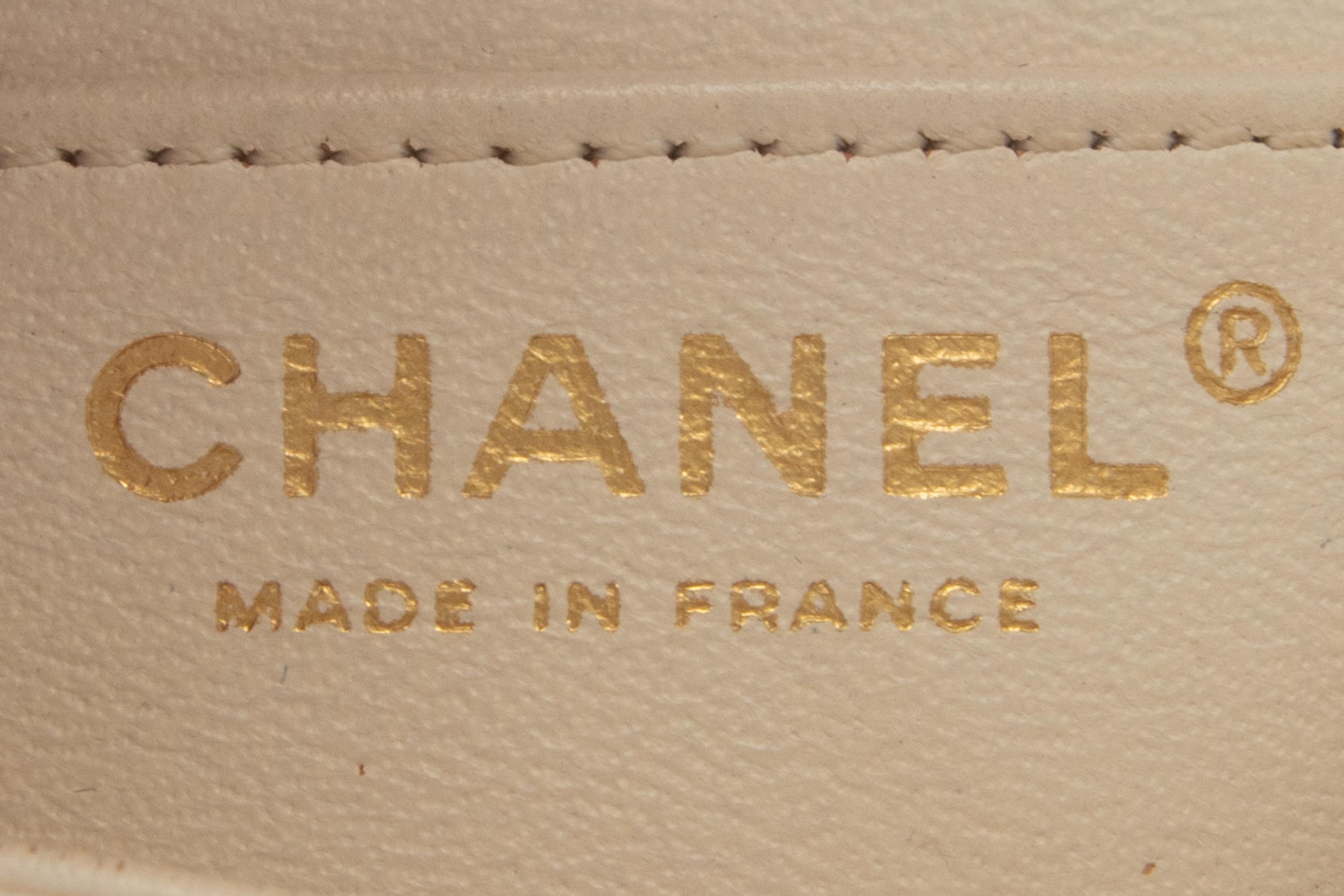 Chanel Mini Flap Bag in White Caviar Leather