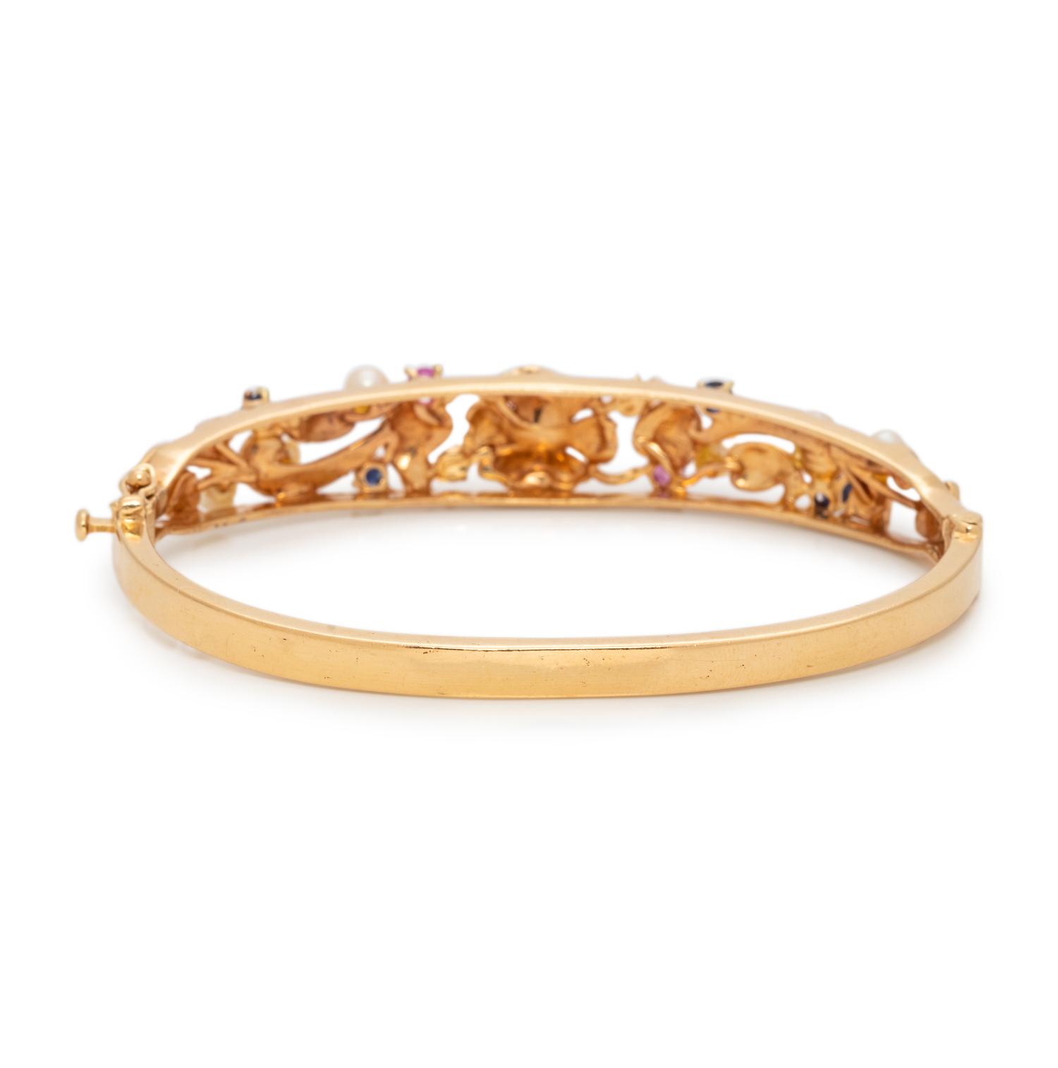 YELLOW GOLD AND GEMSTONE BANGLE BRACELET