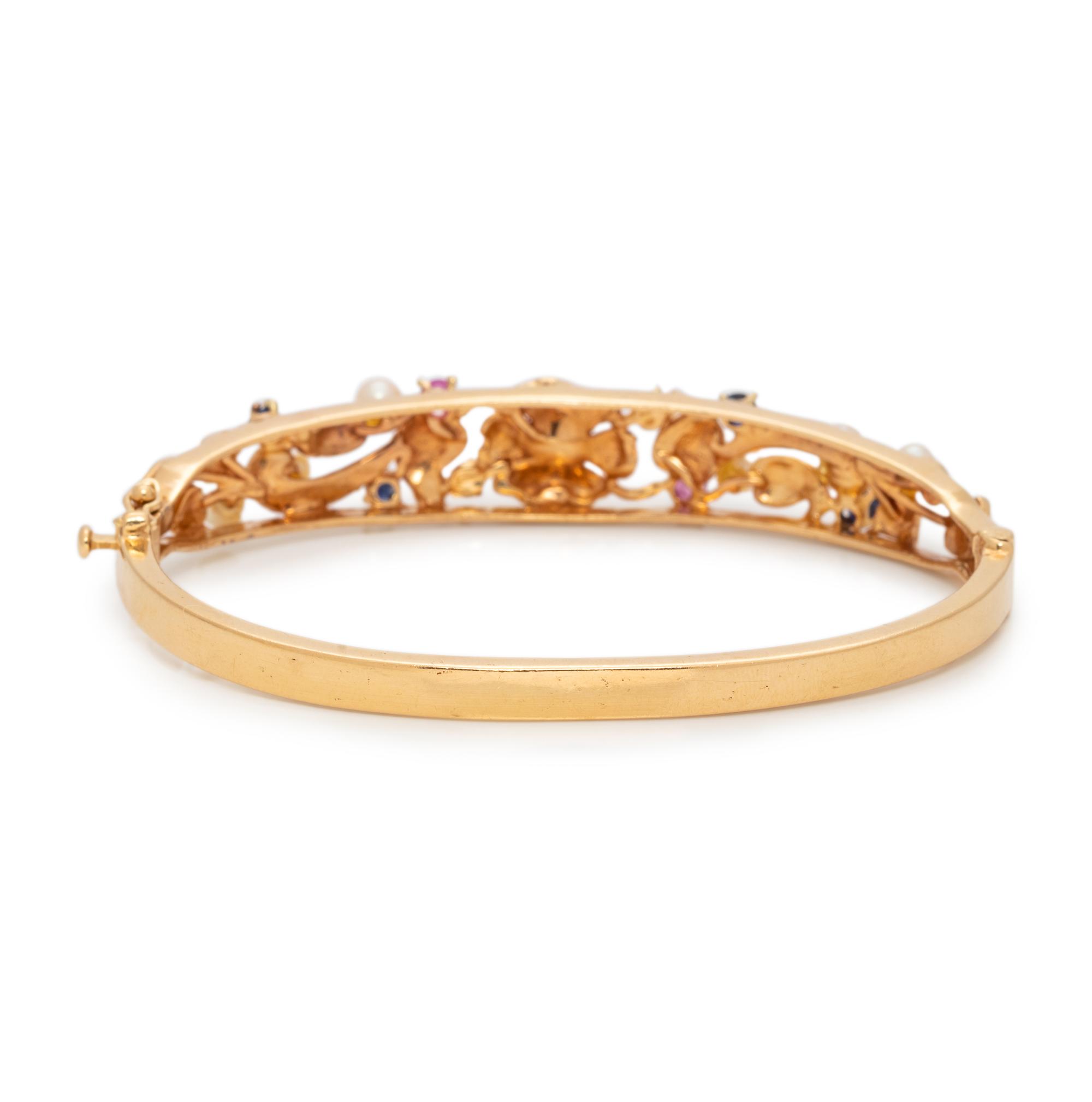 YELLOW GOLD AND GEMSTONE BANGLE BRACELET