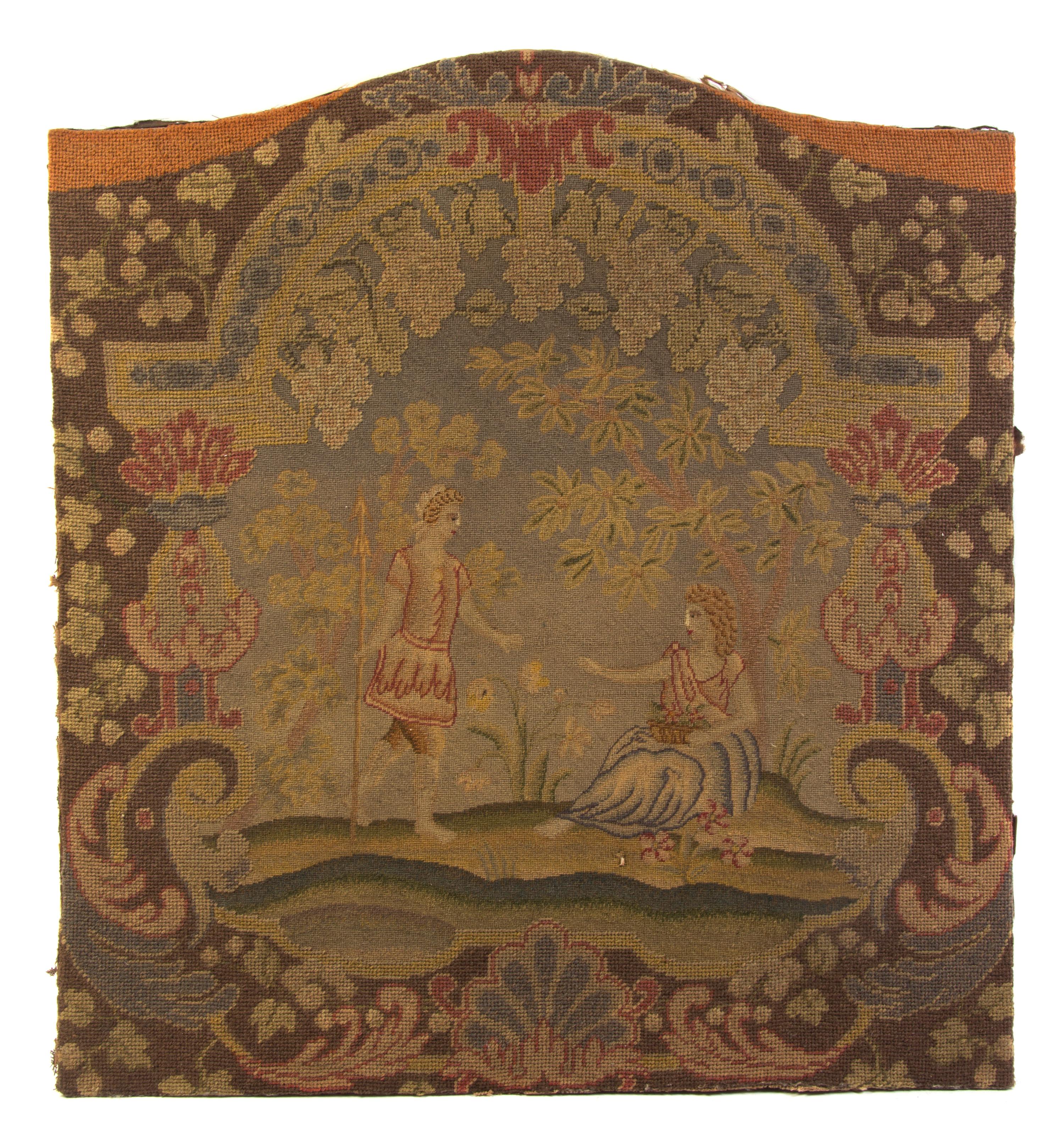 An English Needlepoint Firescreen, Height 29 1/2 x width 27 inches.
