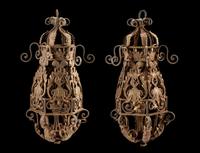 A Pair of Spanish Wrought Iron and Tole Lanterns