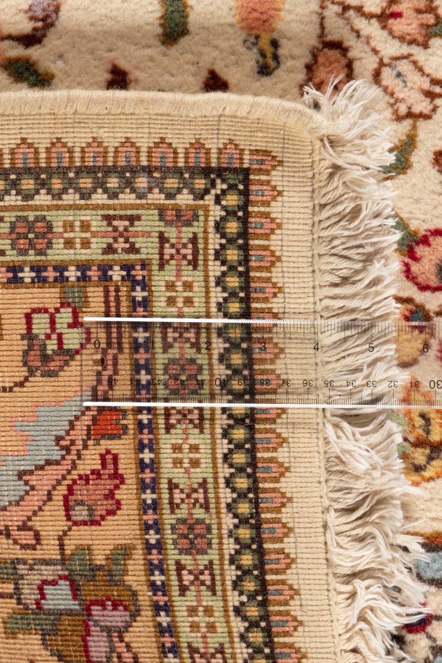 A Tabriz Wool Rug