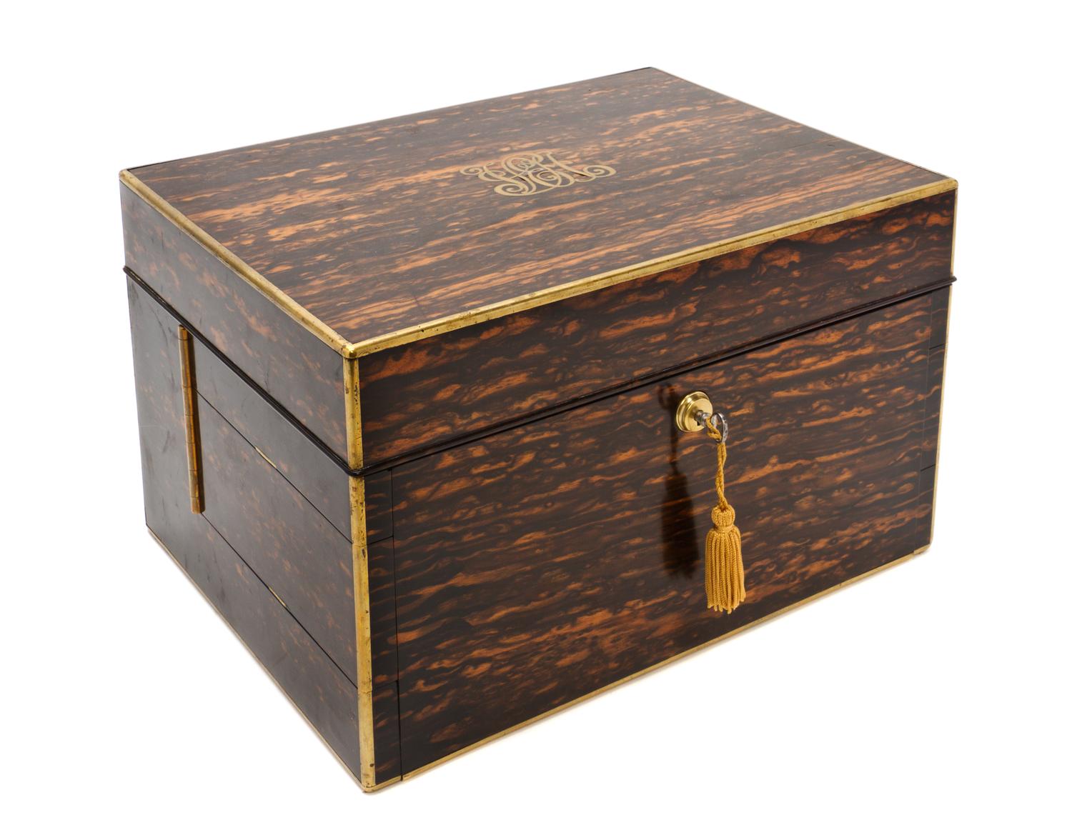 A Victorian Calamander, Silver and Cut Glass Dressing Box, RETAILED BY HOWELL, JAMES & CO., LONDON, Height 8 1/4 x width 13 1/2 x depth — RETAILED BY HOWELL, JAMES & CO., LONDON,