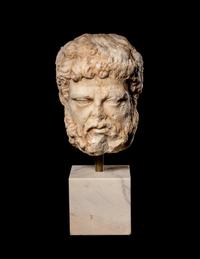 A Roman Marble Head of a Bearded Male, Perhaps Hercules