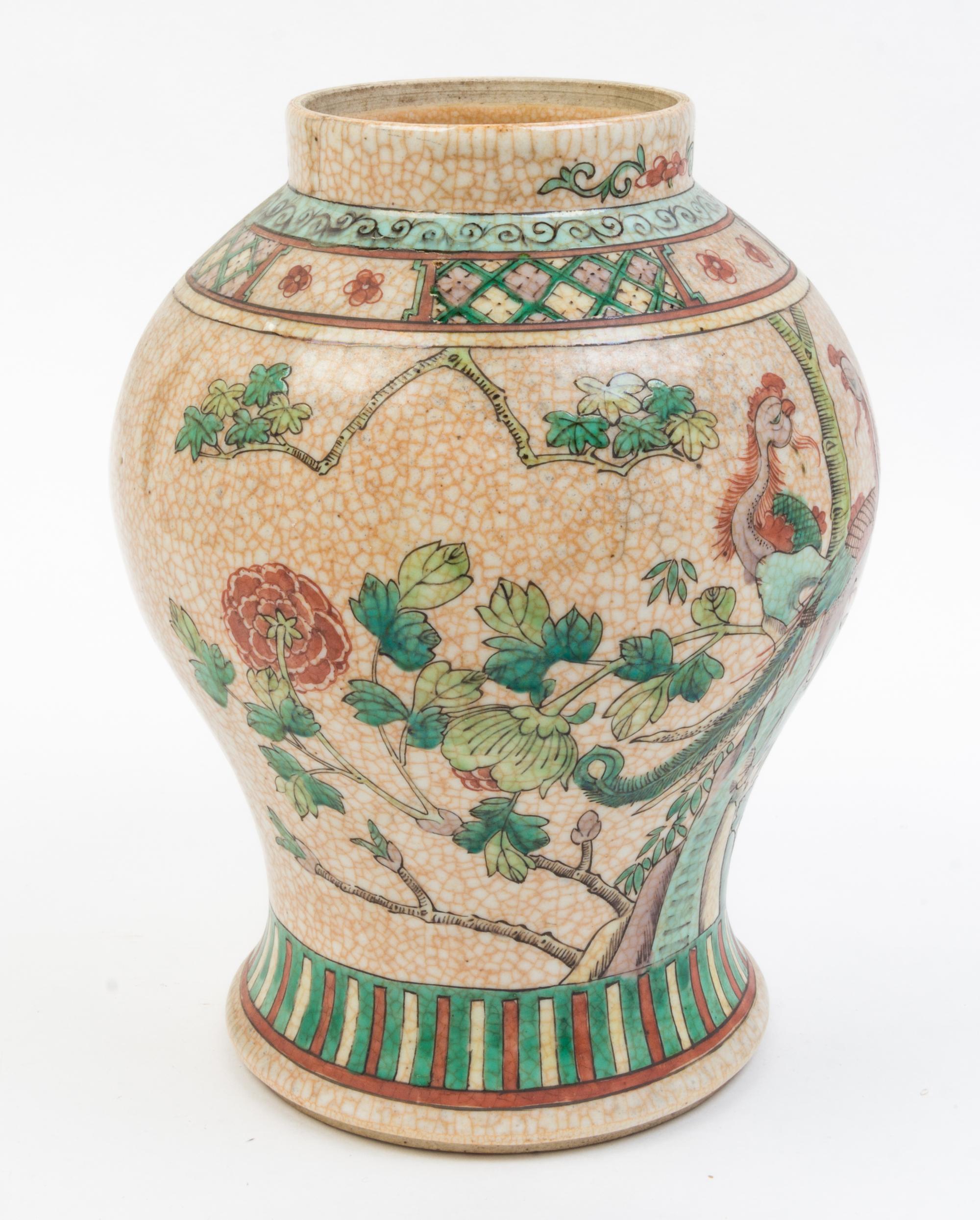 A Famille Verte Porcelain Vase Height 11 1/2 inches.