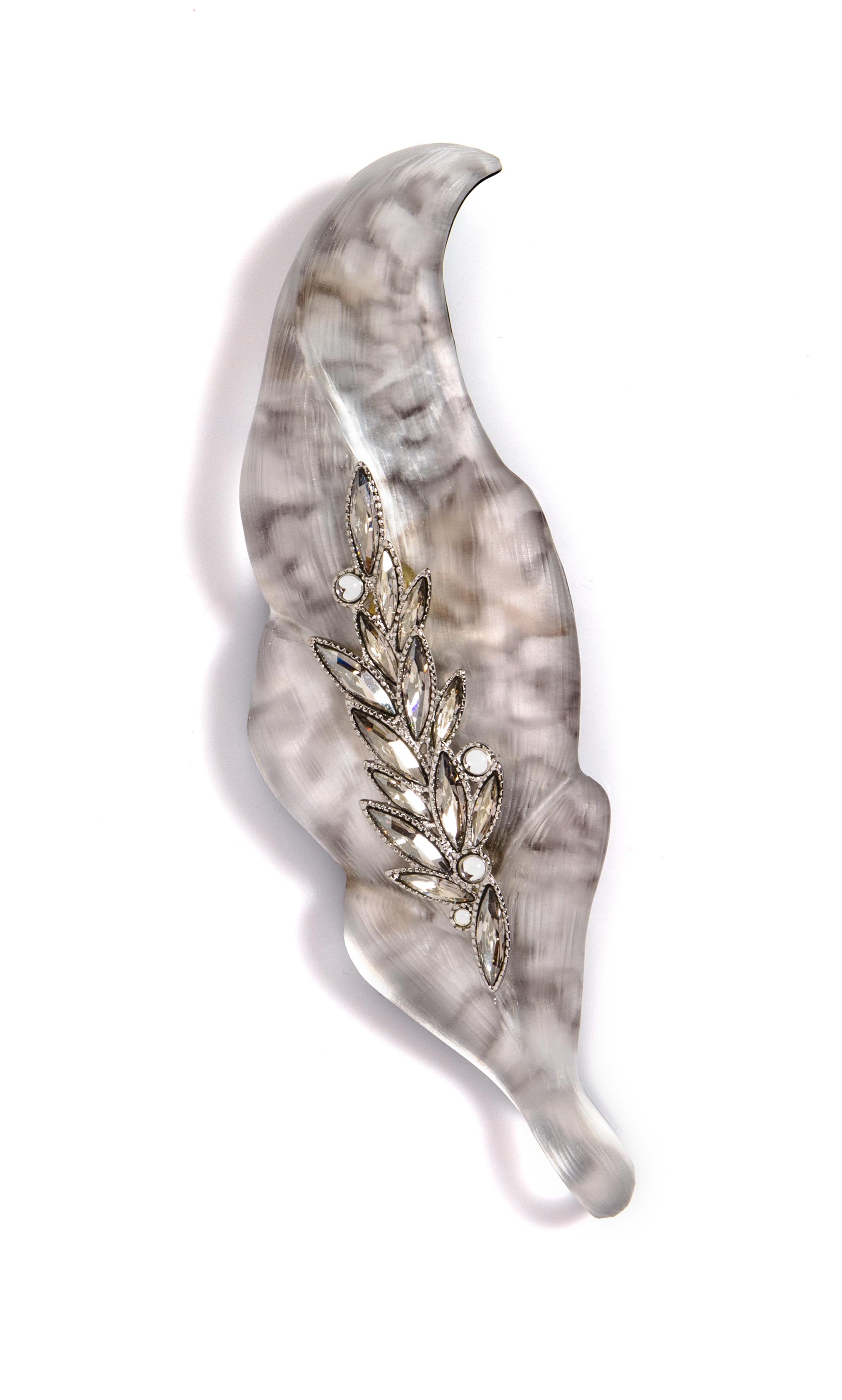 An Alexis Bittar Metallic Silver and Rhinestone Brooch, 6" x 2".
