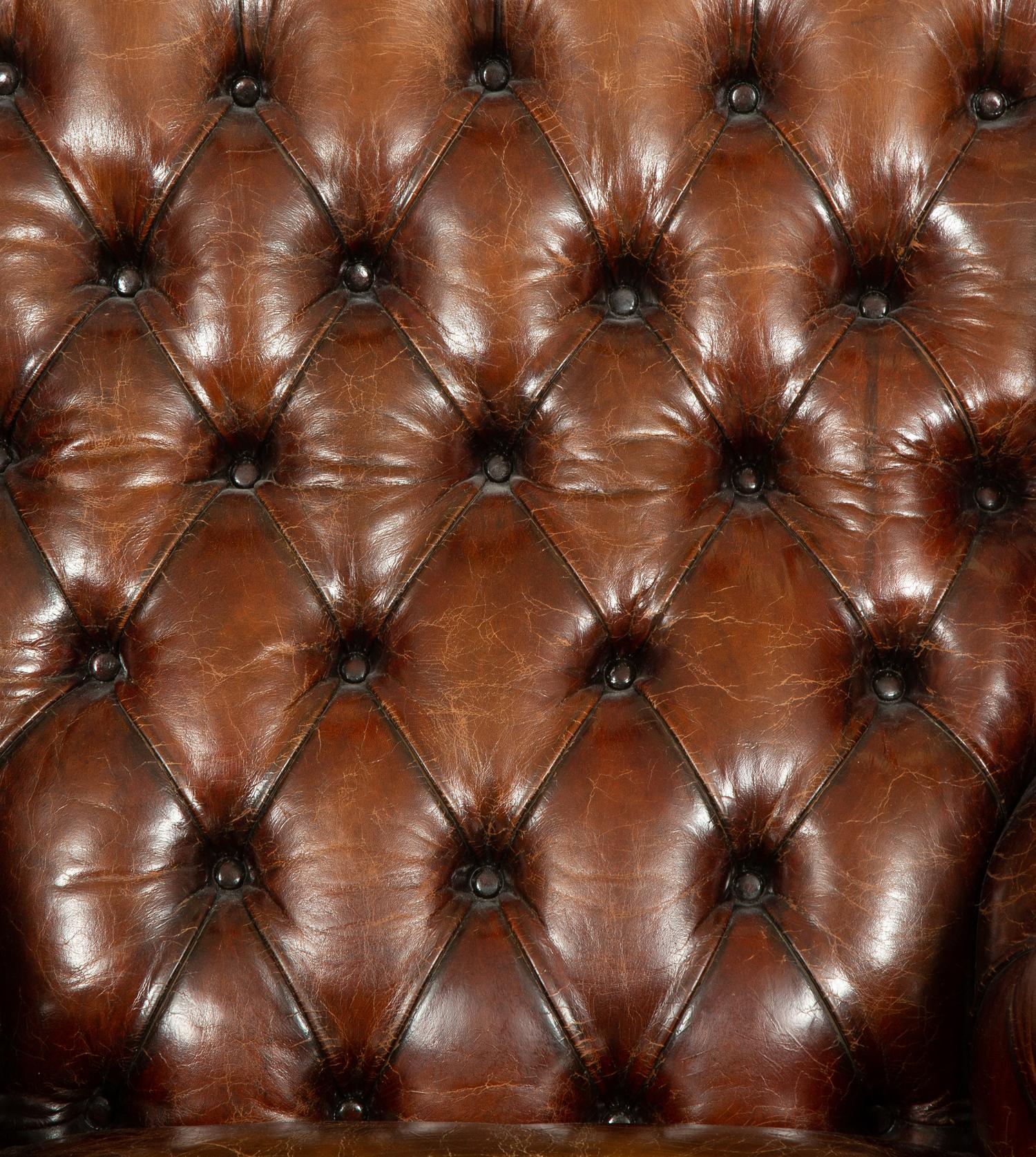 A George III Style Leather Wingback Armchair