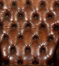 A George III Style Leather Wingback Armchair