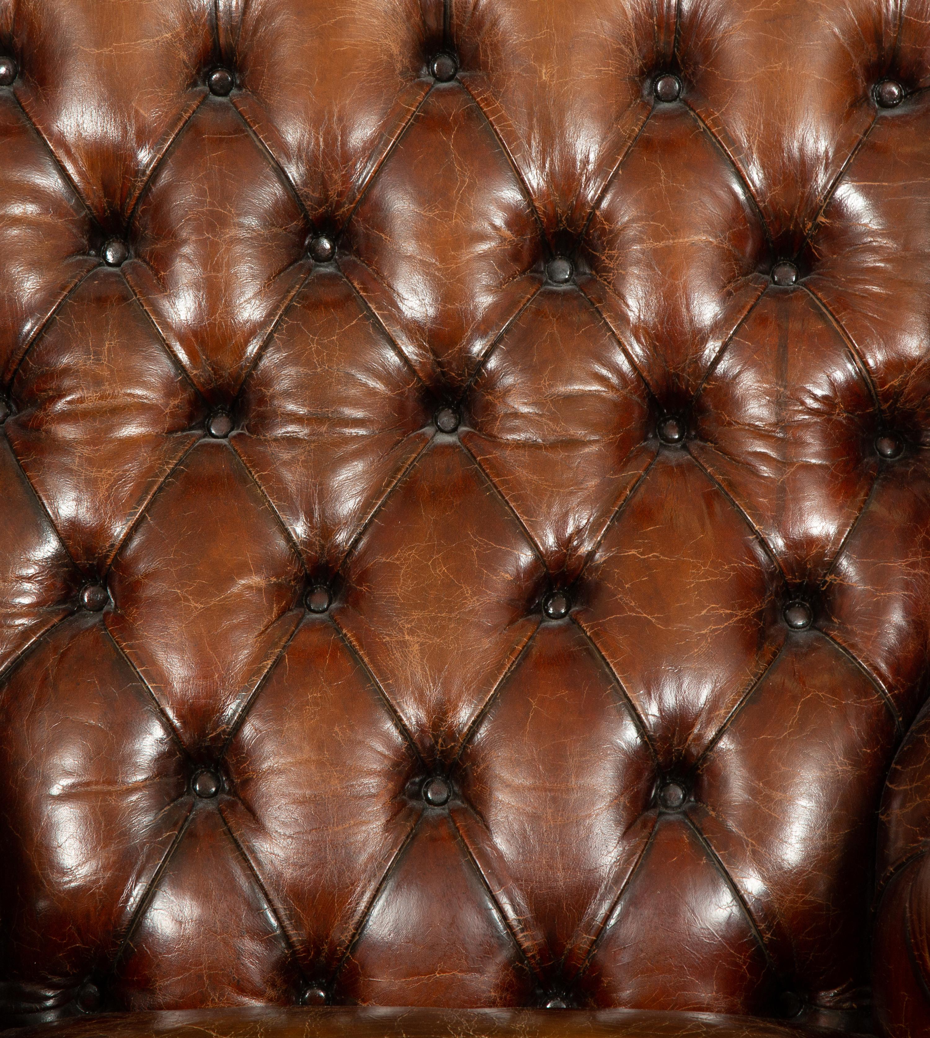 A George III Style Leather Wingback Armchair