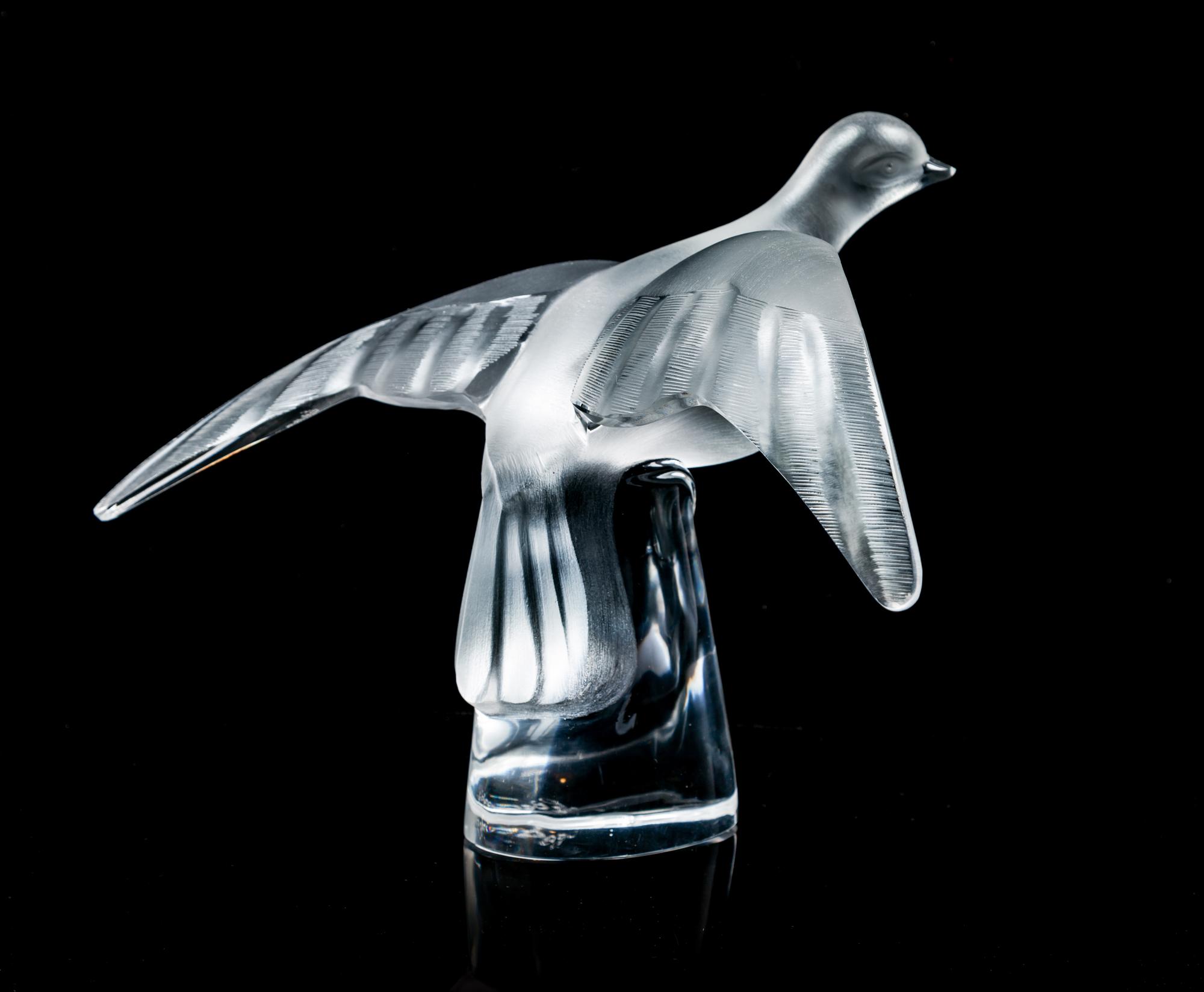 A Lallique Dove Width 12 1/2 inches.